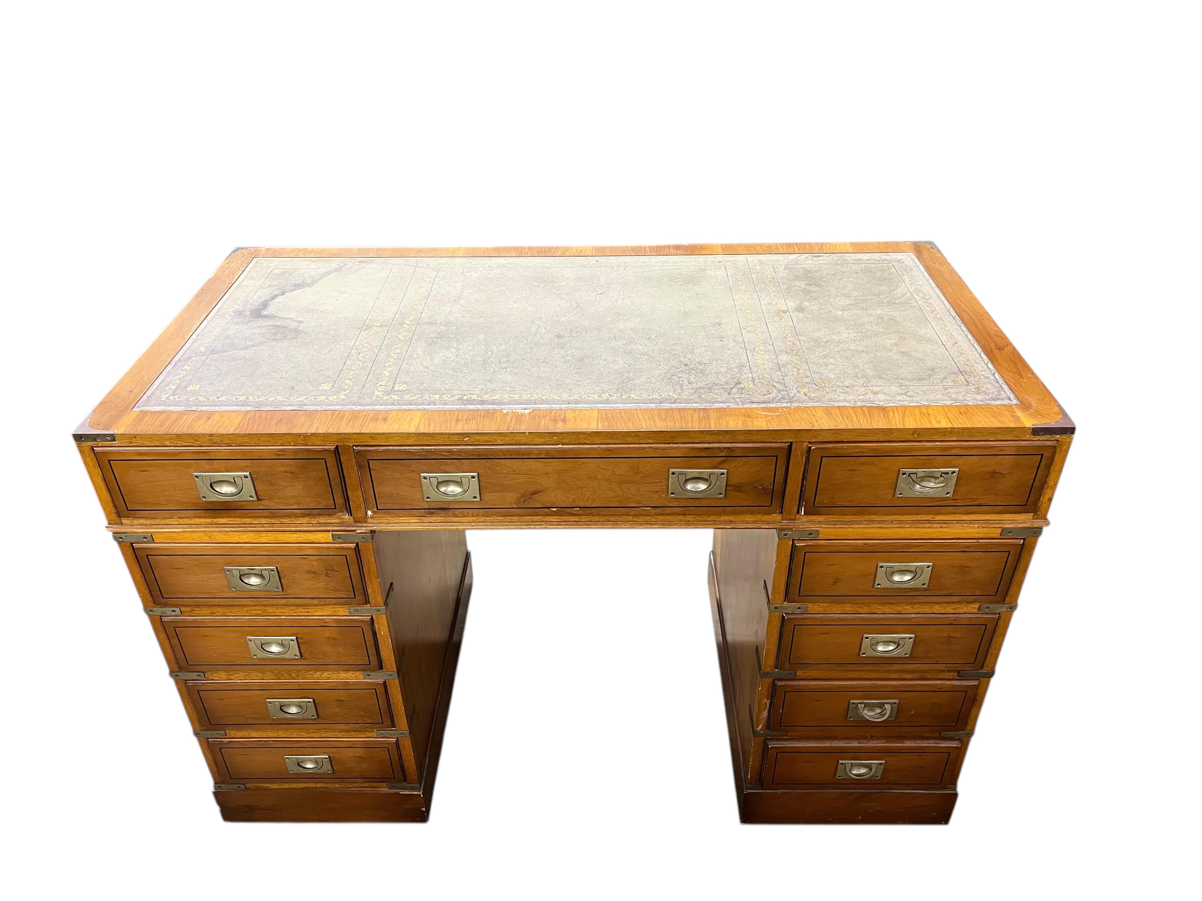 A reproduction yew military style pedestal desk, width 119cm, depth 58cm, height 79cm
